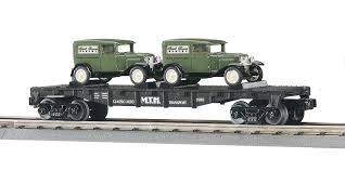 MTH RailKing 30-7647: MTH Auto Transport Flat Car w/ Ertl '50 Panel Trucks