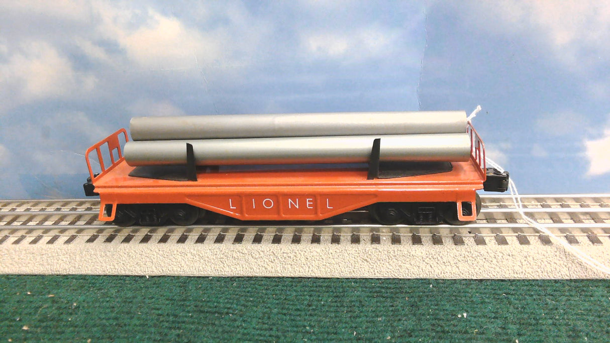 LIONEL FLATCAR WITH PIPES 6121