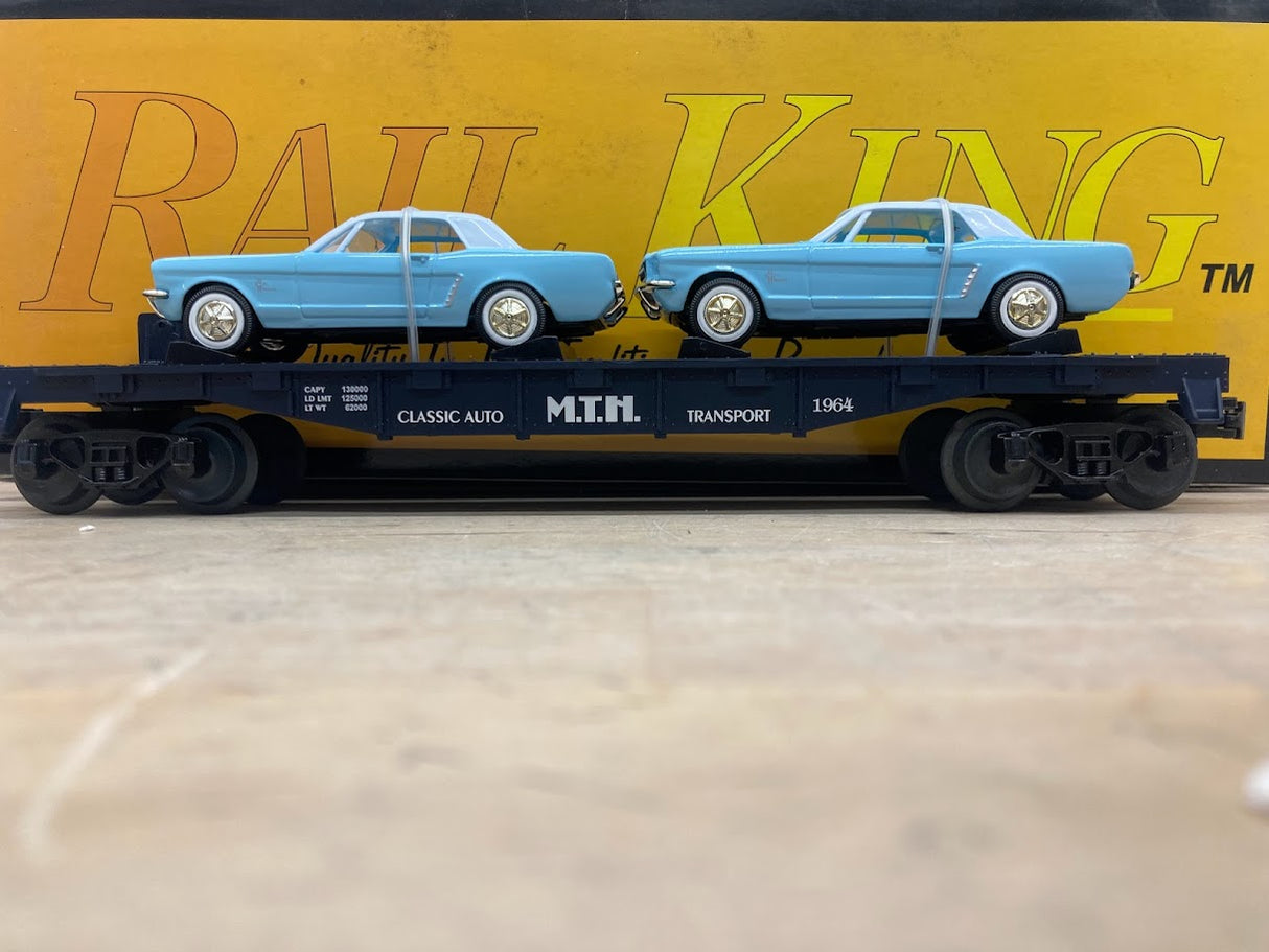 MTH RailKing 30-7617: Flat Car W/ Two '64 Mustangs