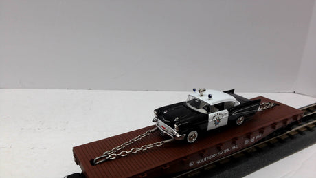 Lionel 6-26906 Southern Pacific Flatcar with Corgi Die-cast '57 Chevy Police Car