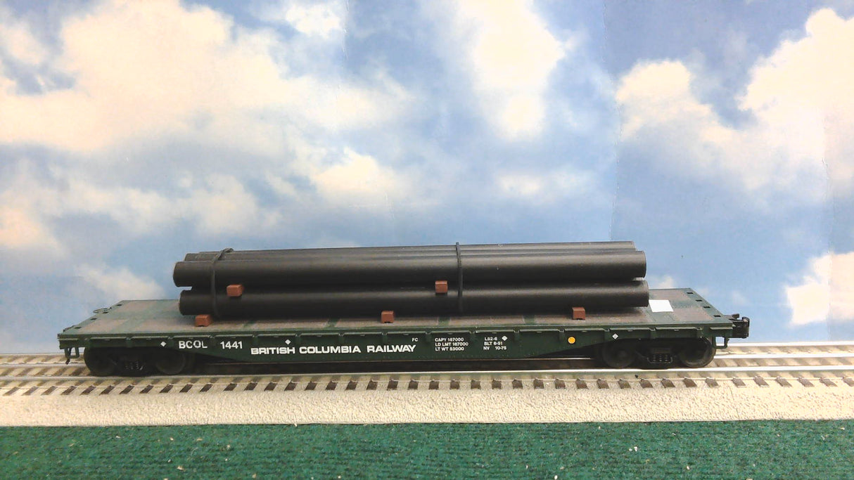 ATLAS BRITISH COLUMBIA RAILWAY FLAT CAR WITH PIPES