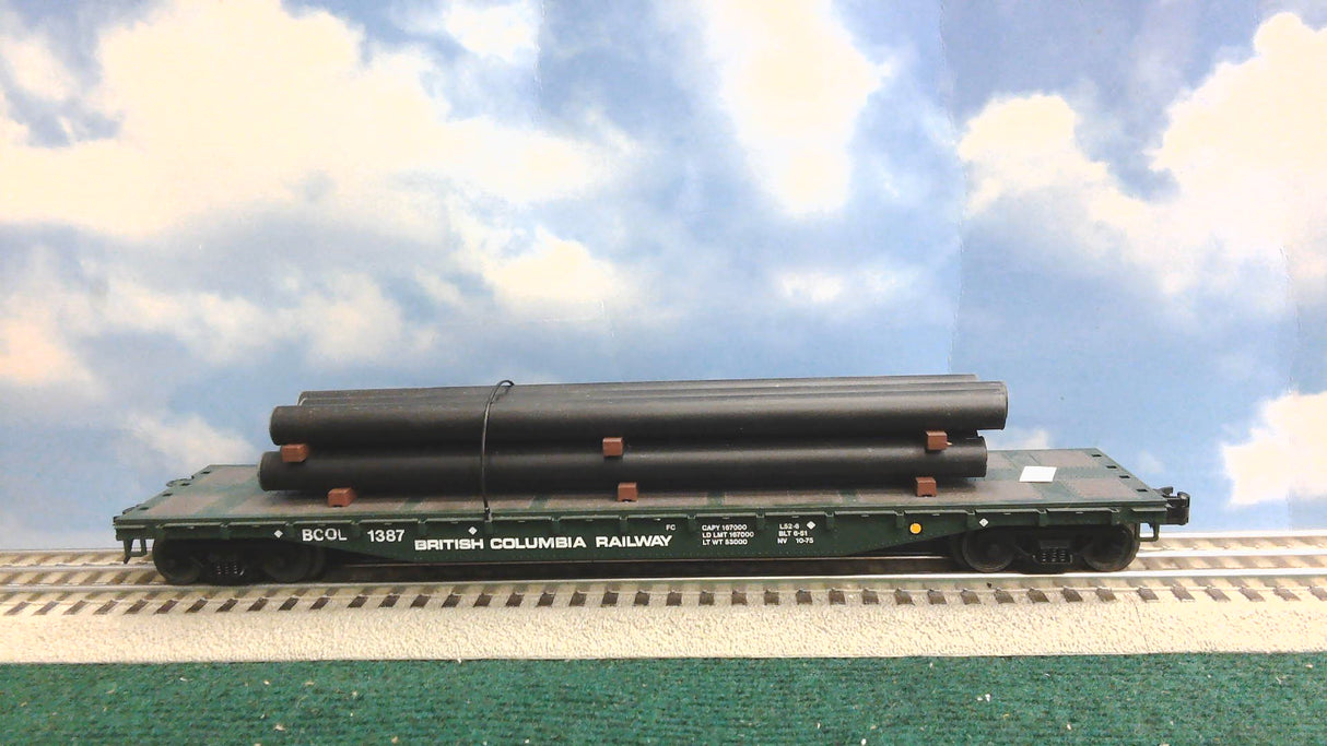 ATLAS BRITISH COLUMBIA RAILWAY FLAT CAR WITH PIPES