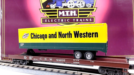 MTH Premier 20-98118: CNW Flat car W/ 40' Trailer